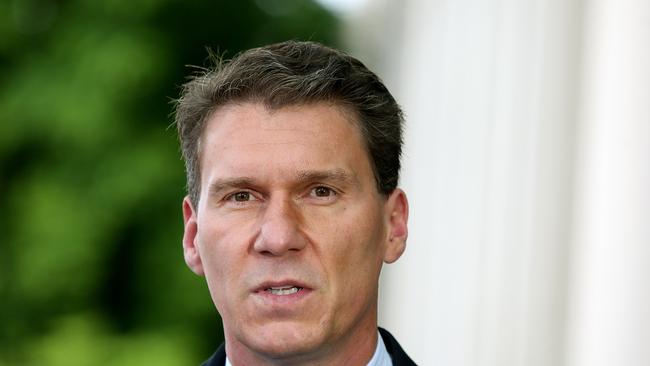 Senator Cory Bernardi speaking at Senate doors at Parliament House in Canberra.