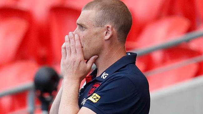 A look of apprehension on the face of Melbourne coach Simon Goodwin during the Dees’ final round clash with Essendon.