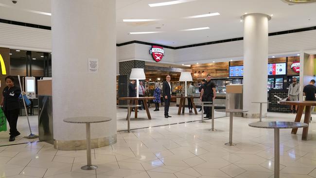 Chairs are removed from a food court in Crown Melbourne. Picture: AAP Image/Scott Barbour