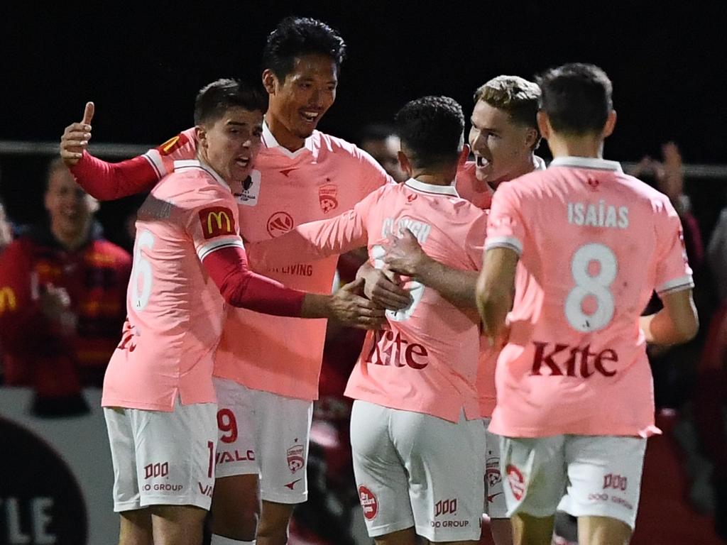 Adelaide United players celebrate during their Australia Cup clash with Adelaide City. Picture: Mark Brake/Getty Images