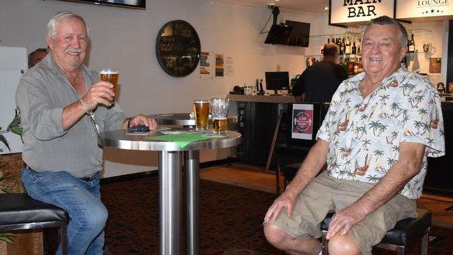 Casino mates Jock Borrowman and Greg Peterson have a toast at the Oxford Hotel for Greg's 77th birthday.