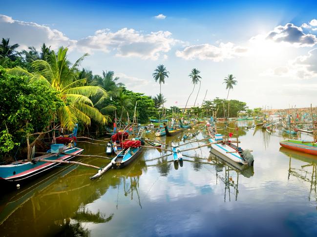 SUNDAY ESCAPE. DOC HOLIDAY 30 SEPTEMBER 2018. Colored boats in tropical bay of Sri Lanka. Picture: iStock