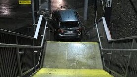 The woman’s car became stuck at the bottom of a steep staircase. Picture: Victoria Police