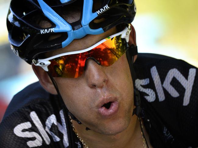 Australia's Richie Porte rides near the finish line during the 197.5 km thirteenth stage of the 101st edition of the Tour de France cycling race on July 18, 2014 between Saint-Etienne and Chamrousse, central eastern France. AFP PHOTO / LIONEL BONAVENTURE