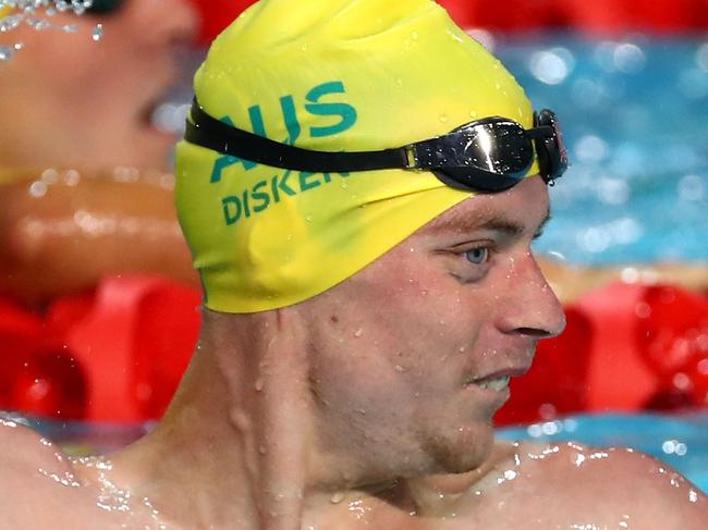 GOLD COAST, AUSTRALIA - APRIL 06:  Timothy Disken of Australia celebrates victory in the Men's S9 100m Freestyle Final on day two of the Gold Coast 2018 Commonwealth Games at Optus Aquatic Centre on April 6, 2018 on the Gold Coast, Australia.  (Photo by Clive Rose/Getty Images)