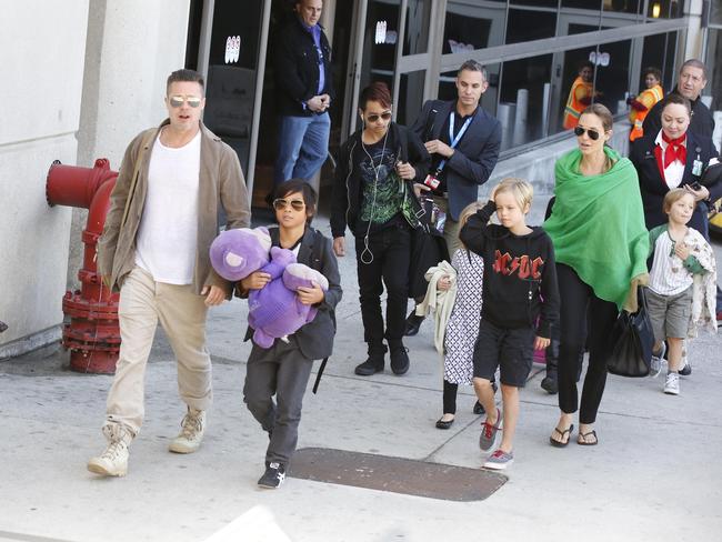 Big family ... Brad Pitt and Angelina Jolie with their brood at Los Angeles Airport. Picture: GVK/Bauer-Griffin/GC Images