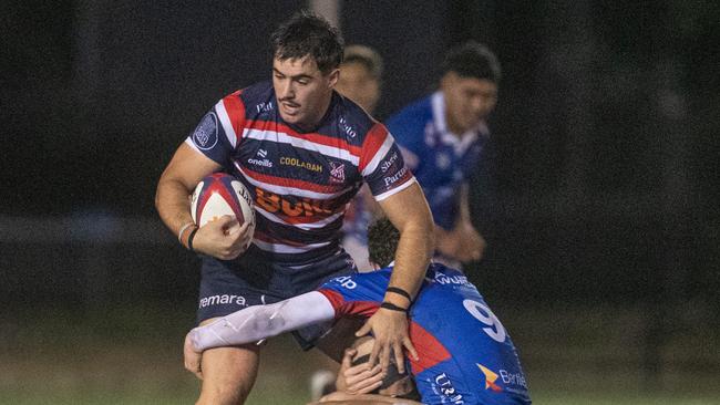 Easts player Zach Fittler getting plenty of attention from a Manly player: