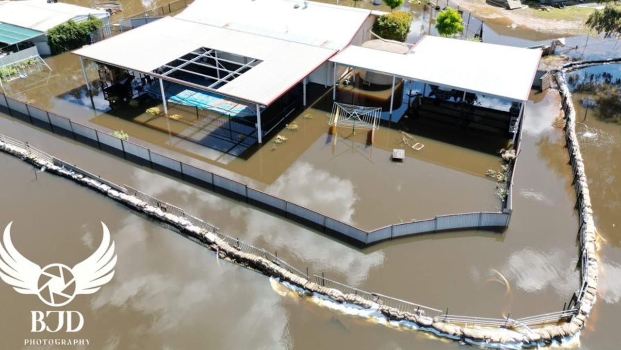 Flooding along the NSW town of Condobolin (pictured) has prompted residents to erect a temporary levee that has become known as the “Great Wall of Condo” as protection from the Lachlan River’s rising waters. Picture: Brayden Davis/ BJD Photography