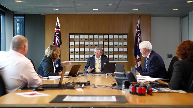 State Parole Authority chairman David Frearson SC presides over a parole meeting with panel members in Parramatta. Picture: Sam Ruttyn