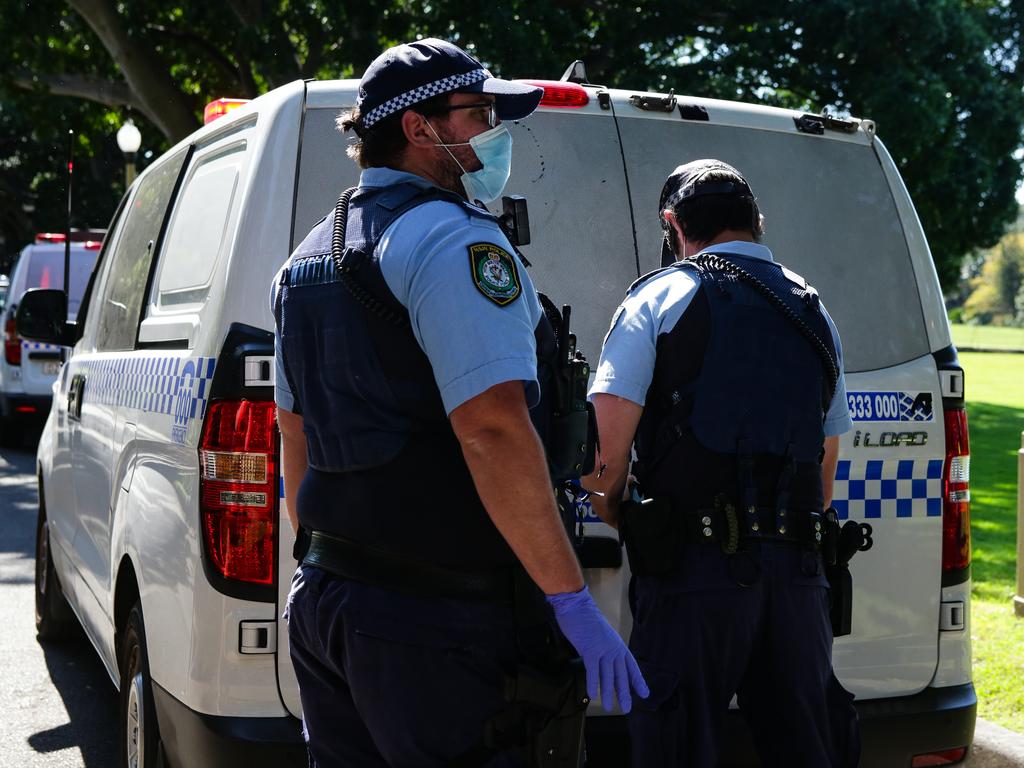 SYDNEY, AUSTRALIA - NewsWire Photos, AUGUST, 31, 2021: Police arrest members of the public during a protest at Govt House in Sydney. Picture: NCA NewsWire/ Gaye Gerard