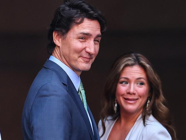 MEXICO CITY, MEXICO - JANUARY 11: Justin Trudeau Prime Minister of Canada and Sophie Gregoire Trudeau gesture during the welcome ceremony for Canadian Prime Minister Justin Trudeau as part of the '2023 North American Leaders' Summit at Palacio Nacional on January 11, 2023 in Mexico City, Mexico. President Lopez Obrador and Canadian Prime Minister Justin Trudeau gather in Mexico as part of the 10th North American Leaders' Summit. The agenda includes topics on the climate change, immigration, trade and economic integration, security among others. (Photo by Manuel Velasquez/Getty Images)