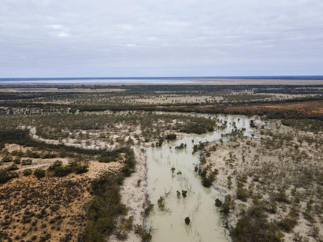 MENINDEE, AUSTRALIA - MAY 16: An aerial view of water flowing between Lake Menindee and Lake Cawndilla on May 16, 2021 in Menindee, Australia. The Menindee Lakes are a system of nine large, shallow lakes in far-western New South Wales. The region has been crippled by the recent drought, which broke earlier in 2021. In 2018/19, more than a million fish including Murray cod, Golden Perch and Bony bream died in three Menindee fish kills. The recent water flow along the Darling-Baaka River system in northern New South Wales has now made it to the Menindee Lakes and for the first time since 2016 there has been enough water to open the gates between Lake Pamamaroo and Lake Menindee. (Photo by Brook Mitchell/Getty Images) (Photo by Brook Mitchell/Getty Images)