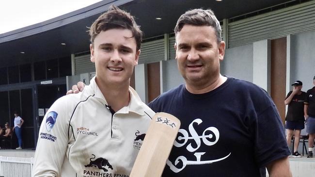 Tyran and father Glen Liddiard after his stunning performance with the bat. Picture: Barry Clarence