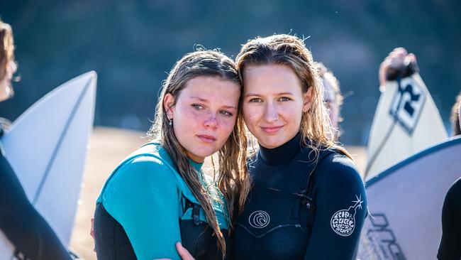 Zoe Bardy on the left photographed with a friend at the memorial 'Paddle Out for Chumpy' held at North Narrabeen Beach. Picture: Monique Harmer