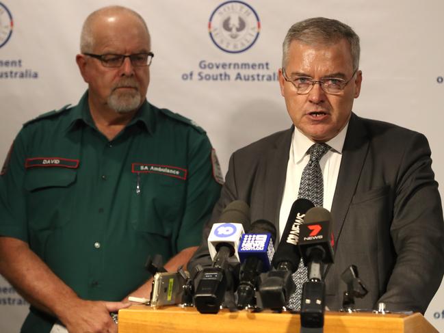 Stephen Wade, South Australian Health Minister and David Place, South Australian Ambulance Service CEO holds a post-cabinet press conference to release the South Australian Ambulance Service adverse incidents report in Adelaide, Monday, February 25, 2019.  (AAP Image/Kelly Barnes) NO ARCHIVING