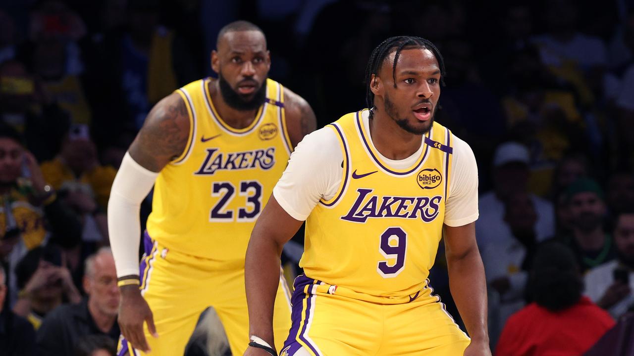 LOS ANGELES, CALIFORNIA - OCTOBER 22: LeBron James #23 and Bronny James #9 of the Los Angeles Lakers on defense during the second quarter against the Minnesota Timberwolves at Crypto.com Arena on October 22, 2024 in Los Angeles, California. (Photo by Harry How/Getty Images)