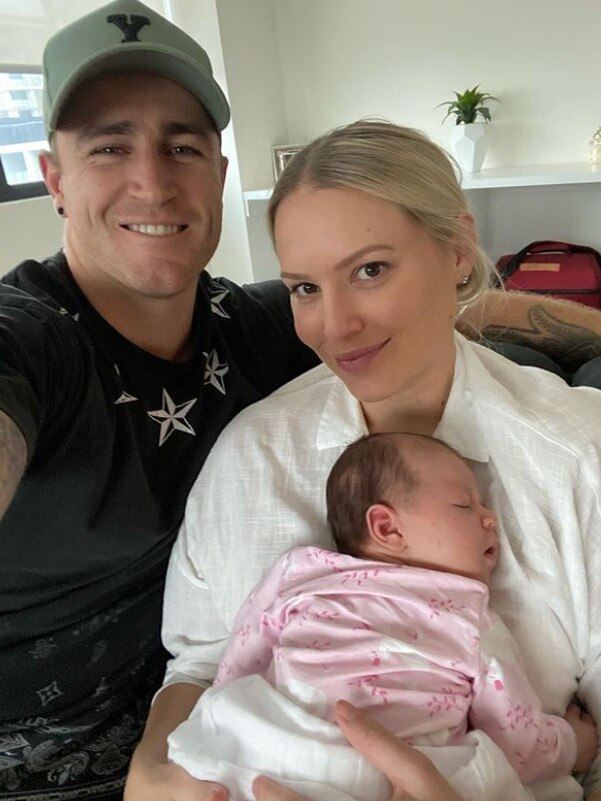 Sharks player Cameron King with his fiance Kristy Heathcote and their new baby girl Arabella.