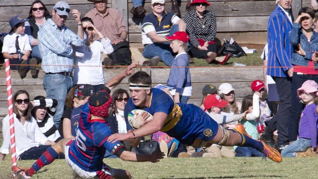 Rhys Martin scores a try for Grammar. O'Callaghan Cup played at Downlands College. Saturday, Aug 30, 2014. Photo Nev Madsen / The Chronicle