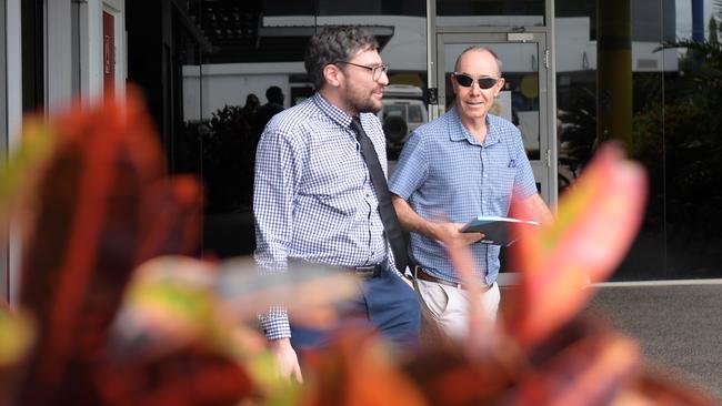 Development Consent Authority lawyer Jon Bortoli and senior compliance and enforcement officer Richard Llyod leave NTCAT. Picture: (A)manda Parkinson