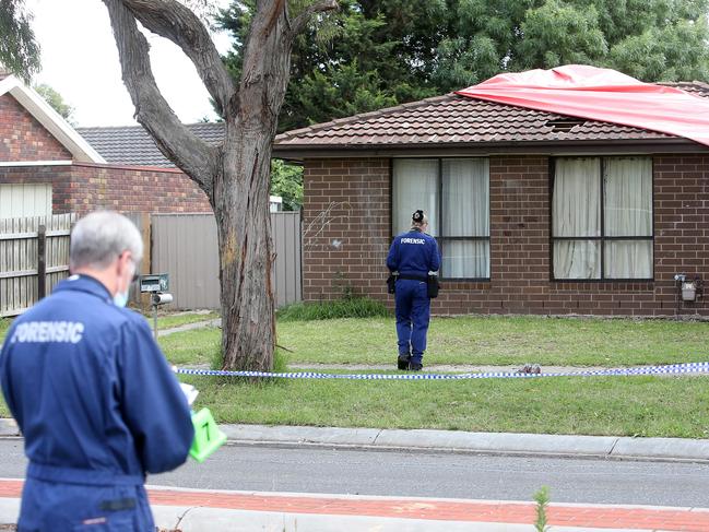 Police investigate the scene.