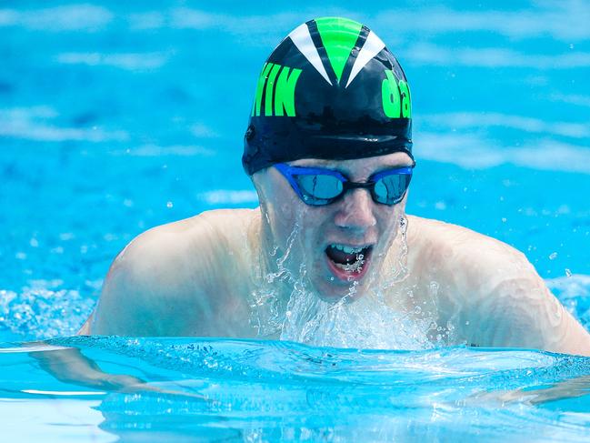 Darwin’s Magnus Turner in the 100m breaststroke. Picture: Glenn Campbell