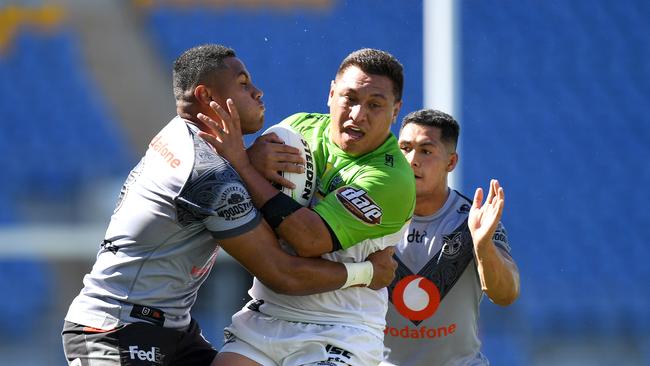 GOLD COAST, AUSTRALIA - MARCH 21: Josh Papalii of the Raiders takes on the defence during the round 2 NRL match between the New Zealand Warriors and the Canberra Raiders at Cbus Super Stadium on March 21, 2020 in Gold Coast, Australia. (Photo by Bradley Kanaris/Getty Images)