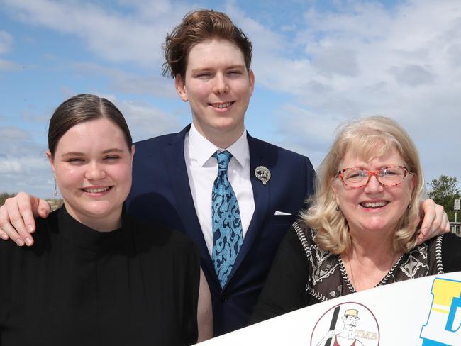 Peter Devenport memorial at Tallebudgera SLSC. Family members of the Late Peter Devenport, Lindy Pickford, Callum Devenport, and  Zoe Devenport, with the boat at the Memorial. Picture Glenn Hampson