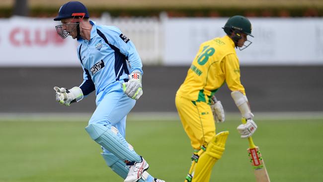 Peter Nevill celebrates one of his eight dismissals during NSW’s win.