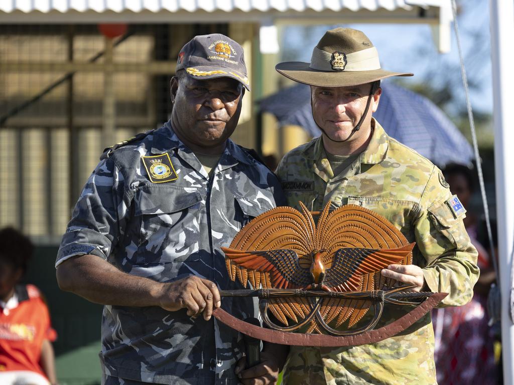 Brigadier Dave McCammon is leaving the Garrison City and the Ã&#148;best job in the armyÃ&#149; after two years as Commander of 3rd Brigade. Commander of the 3rd Brigade, Brigadier David McCammon (right), DSM and Bar, accepts a gift from the Commanding Officer of Lombrum Naval Base, Commander Buni Dorea, during the closing ceremony of Exercise Puk Puk on Manus Island, Papua New Guinea. Picture: Supplied.