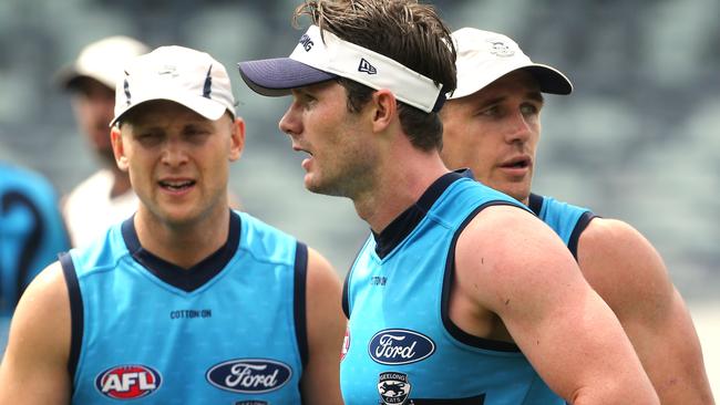 Patrick Dangerfield, front, with team-mates Gary Ablett and Joel Selwood.