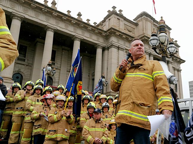 Fire Fighters Rally on the steps of Parliament House, Melbourne.United Firefighters Union secretary Peter Marshall speaks to the firefighters. Picture: Tim Carrafa