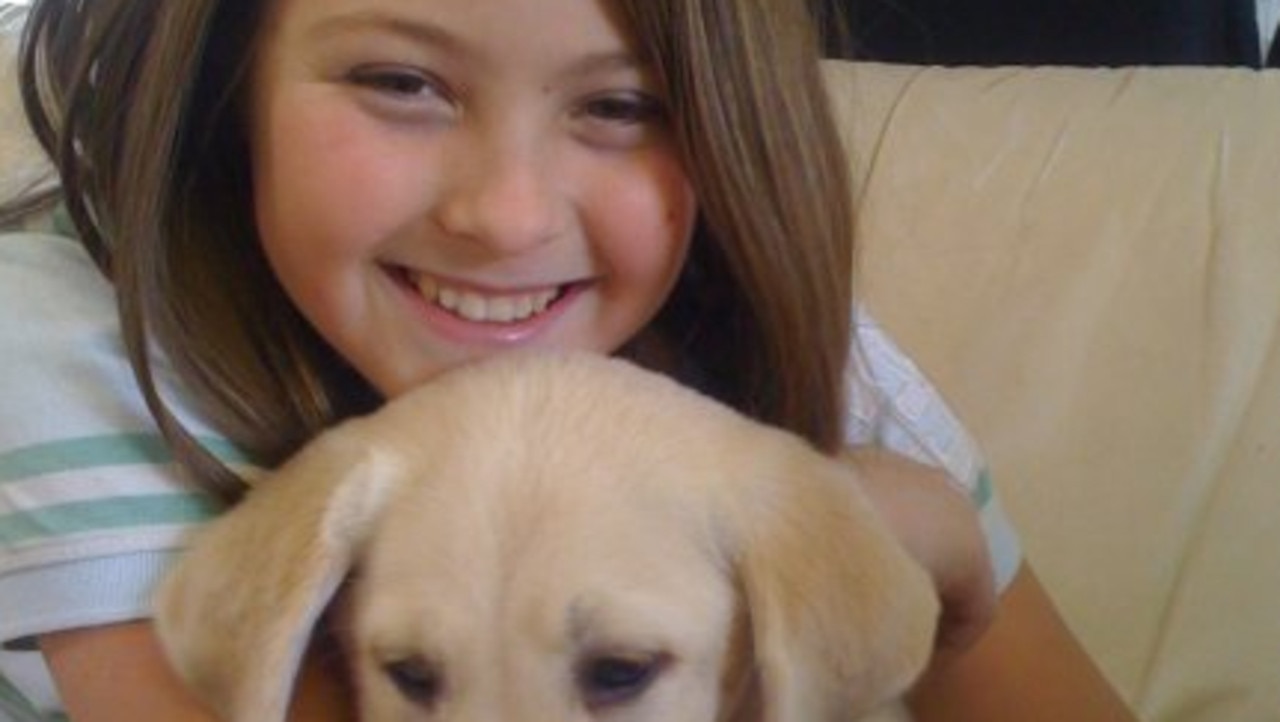 Kira, pictured in 2009, with her dog Tucker. Picture: Facebook @Kira Kerkorian