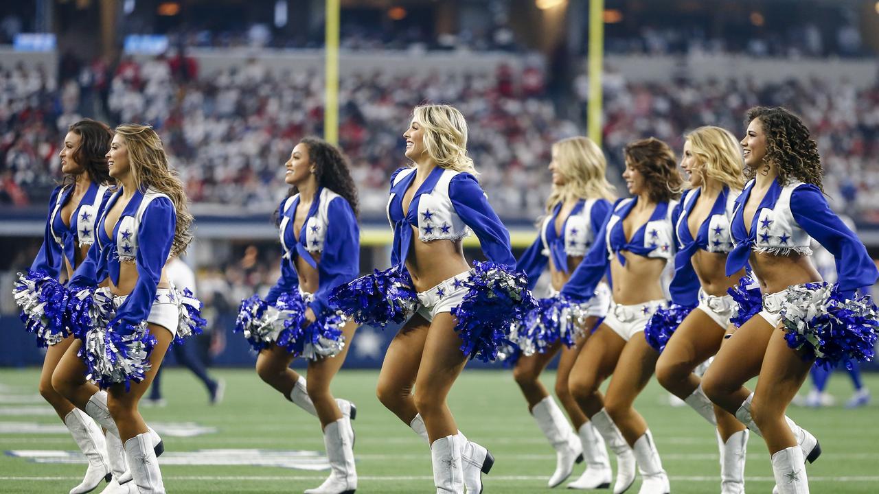 ARLINGTON, TX - JANUARY 16: The Dallas Cowboys Cheerleaders perform during the NFC Wild Card game between the Dallas Cowboys and the San Francisco 49ers on January 16, 2022 at AT&amp;T Stadium in Arlington, Texas. (Photo by Matthew Pearce/Icon Sportswire via Getty Images)