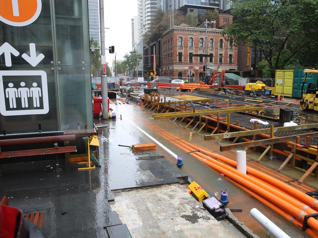 As The low hits Sydney .the light rail is now under water at town hall .picture John Grainger