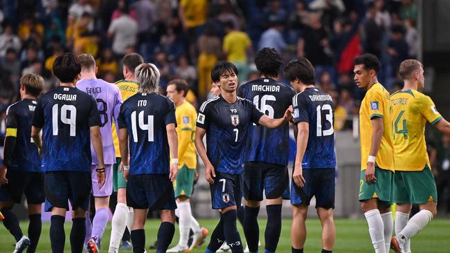 Players from Japan and Australia reflect on their 1-1 draw at Saitama Stadium.. Picture: Kenta Harada/Getty Images