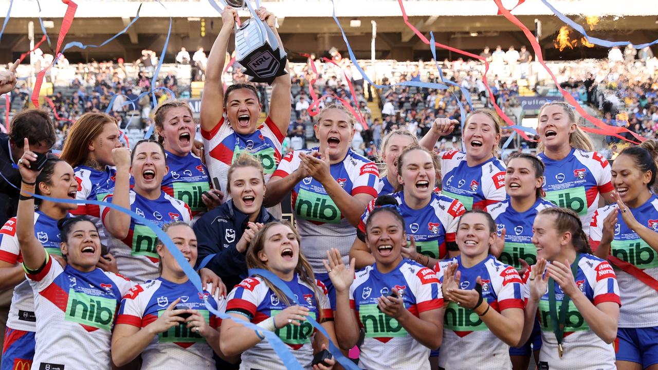 SYDNEY, AUSTRALIA - OCTOBER 02: The Knights celebrate with the NRLW Premiership Trophy after victory in the 2022 NRLW Grand Final match between Newcastle Knights and Parramatta Eels at Accor Stadium, on October 02, 2022, in Sydney, Australia. (Photo by Cameron Spencer/Getty Images)