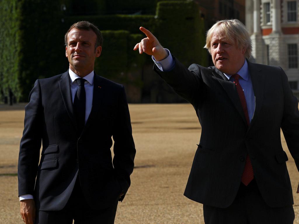 French President Emmanuel Macron, pictured with Boris Johnson, said “Europe’s unity and firmness paid off”. Picture: AFP