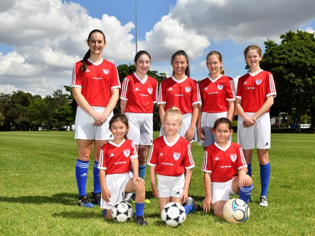 Pagewood Botany Football Club members pose for a photo at Jellicoe Park in Pagewood, Sydney, Saturday, Nov. 11, 2017. (AAP Image/Joel Carrett)