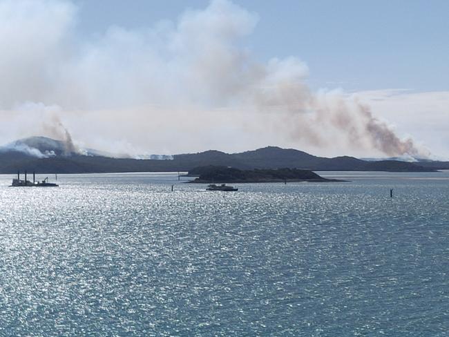 Fires off Gladstone captured from Auckland Point. Picture: Rodney Stevens