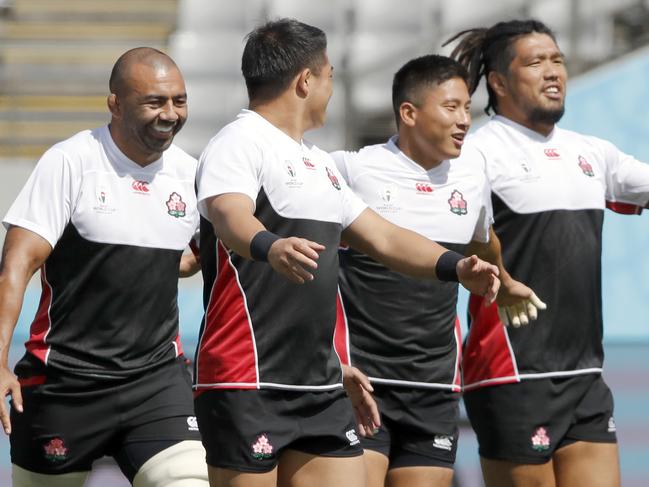 Japan rugby union team players with captain Michael Leitch, center left, attend a training session in Tokyo, Japan, Thursday, Sept. 19, 2019. The Rugby World Cup starts Friday, Sept. 20, with Japan playing Russia, and ends with the final on Nov. 2. (AP Photo/Christophe Ena)