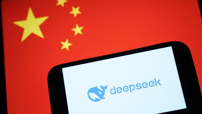 HONG KONG, CHINA - JANUARY 28: In this photo illustration, the DeepSeek logo is seen on a phone in front of a flag of China on January 28, 2025 in Hong Kong, China. Global tech stocks have plummeted following the emergence of DeepSeek, a Chinese AI startup that has developed a competitive AI model at a fraction of the cost of its US rivals, sparking concerns about the high valuations of tech giants like Nvidia. This development has led to significant declines in tech shares across Asia and Europe, with markets in both regions experiencing notable losses as investors reassess the AI landscape and its potential impact on the industry's future. (Photo illustration by Anthony Kwan/Getty Images)