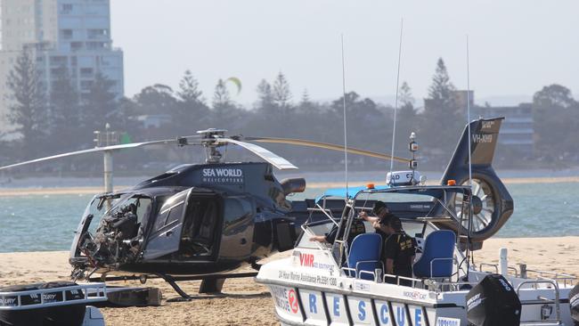 One chopper damaged in the collision was able to land on the sand. Photo – News Media Network