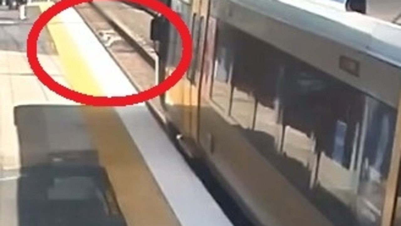 Watch: Runaway dog’s near-miss with oncoming train