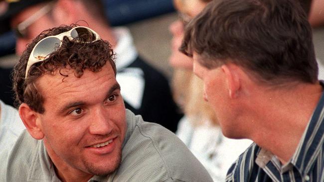 Gorden Tallis, still under contract to St George, watches from the Brisbane bench game against Wests.