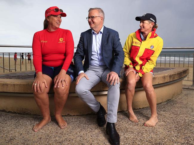 Anthony Albanese with Natalie Jarrott and Lou Youngman from Maroochydore Surf Club on the Sunshine Coast on Friday. Picture: Adam Head