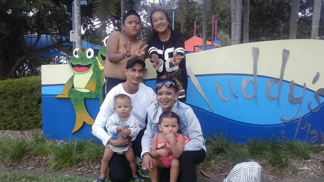 Warren Eaton, 48, who was chased to his death outside Raintrees Shopping Centre in April 2023, pictured with his family.