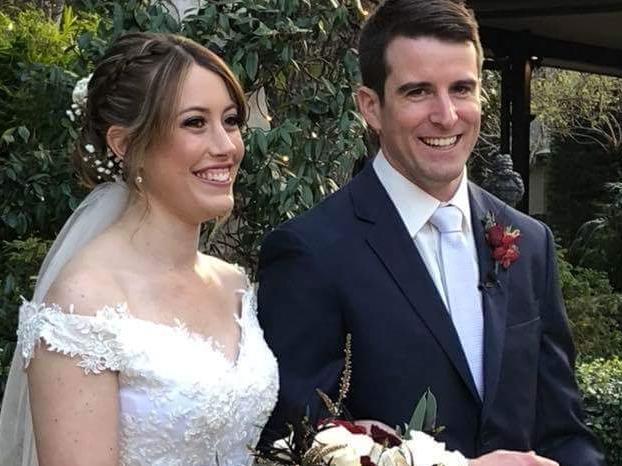 Laura and Joshua Toohey on their wedding day.