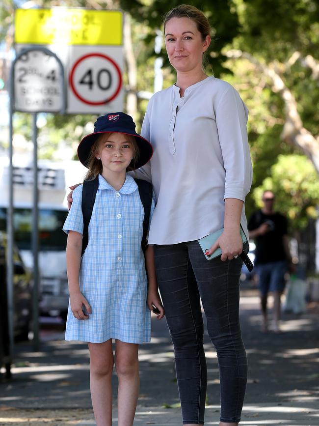 Local mum Ashley Douglas picks up daughter Lucy 8 from Paddington Public School. Picture: Toby Zerna