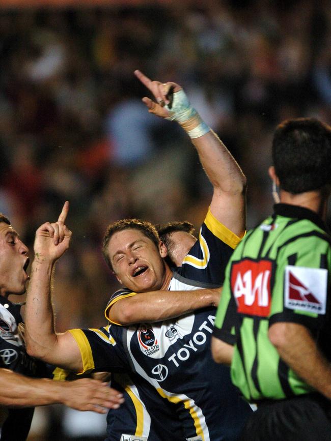 Referee Tim Mander looks at David Myles after he score a try.