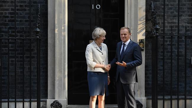British PM Theresa May greets the President of the European Council Donald Tusk in Downing Street. Picture: Getty Imagex/ Leon Neal.